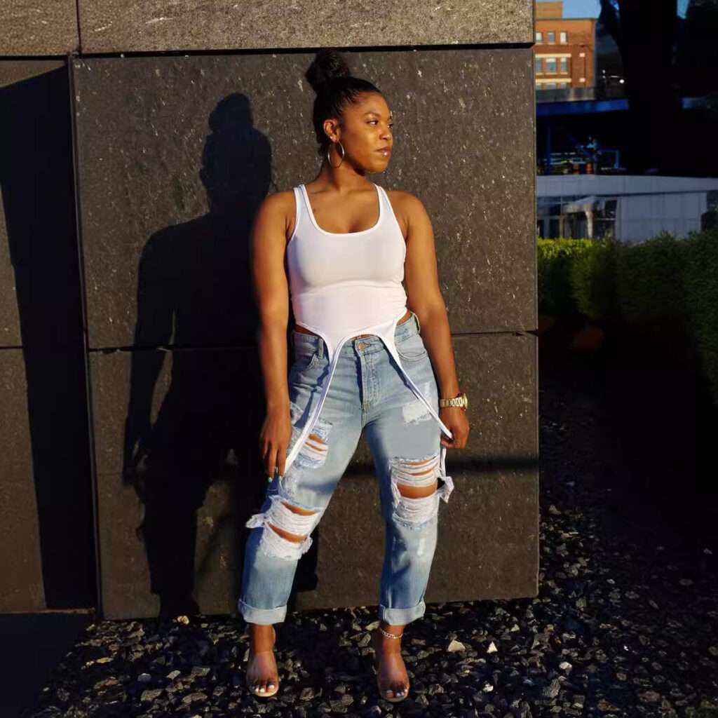 High-Waisted Ripped Nine-Panel Jeans