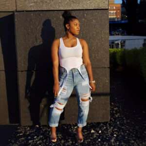 High-Waisted Ripped Nine-Panel Jeans